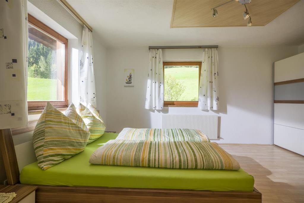 Cama ou camas em um quarto em Bauernhof Hinterfirst