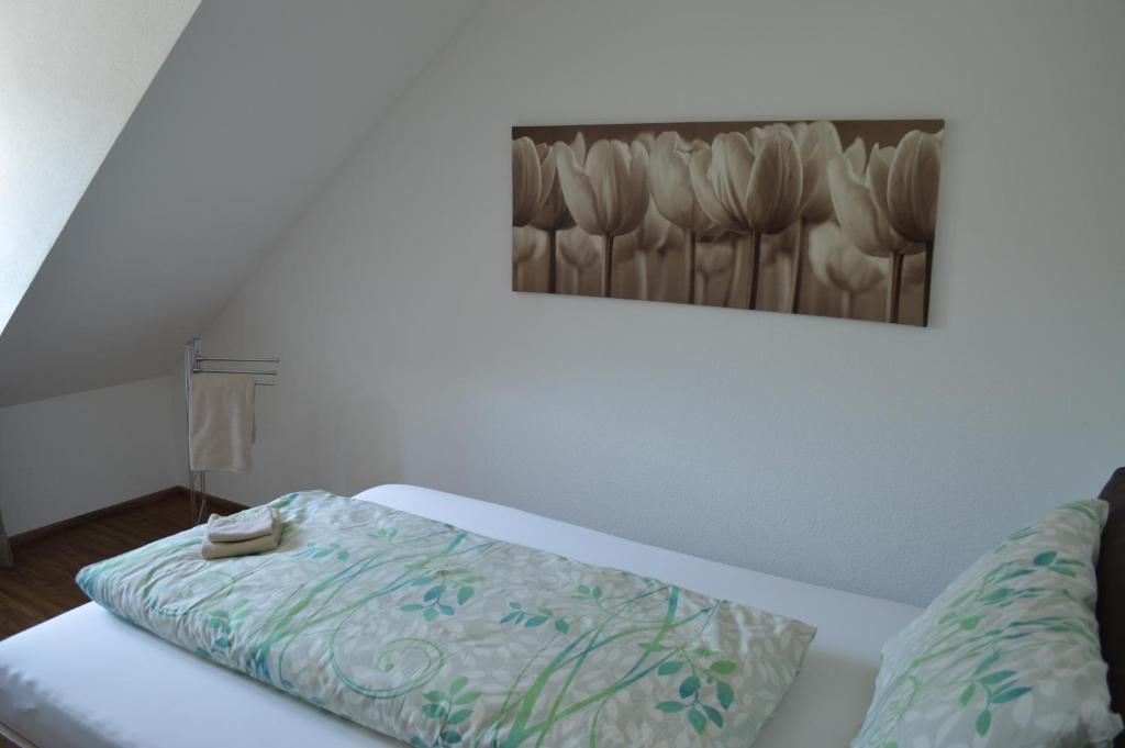 Postel nebo postele na pokoji v ubytování BnB zum Schlüssel