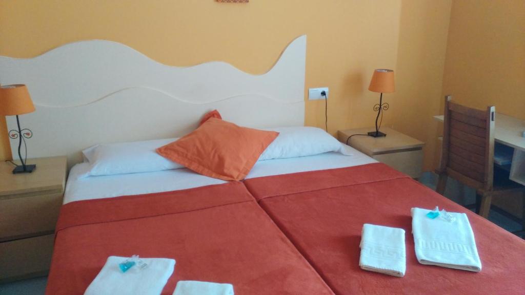Postel nebo postele na pokoji v ubytování Costa HP