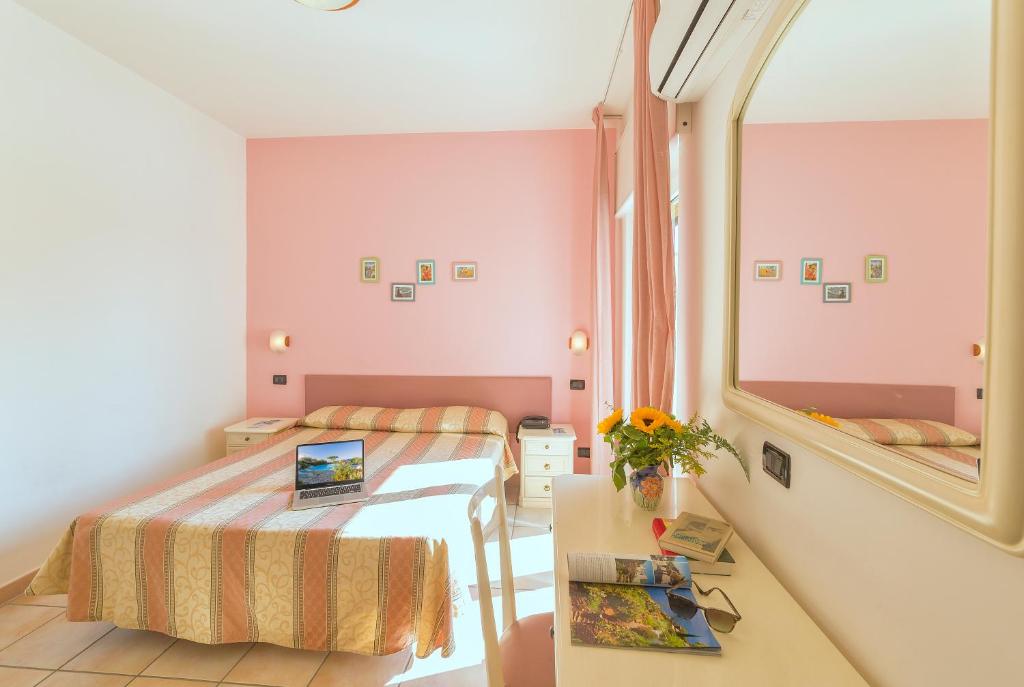 Postel nebo postele na pokoji v ubytování Hotel Costa Citara