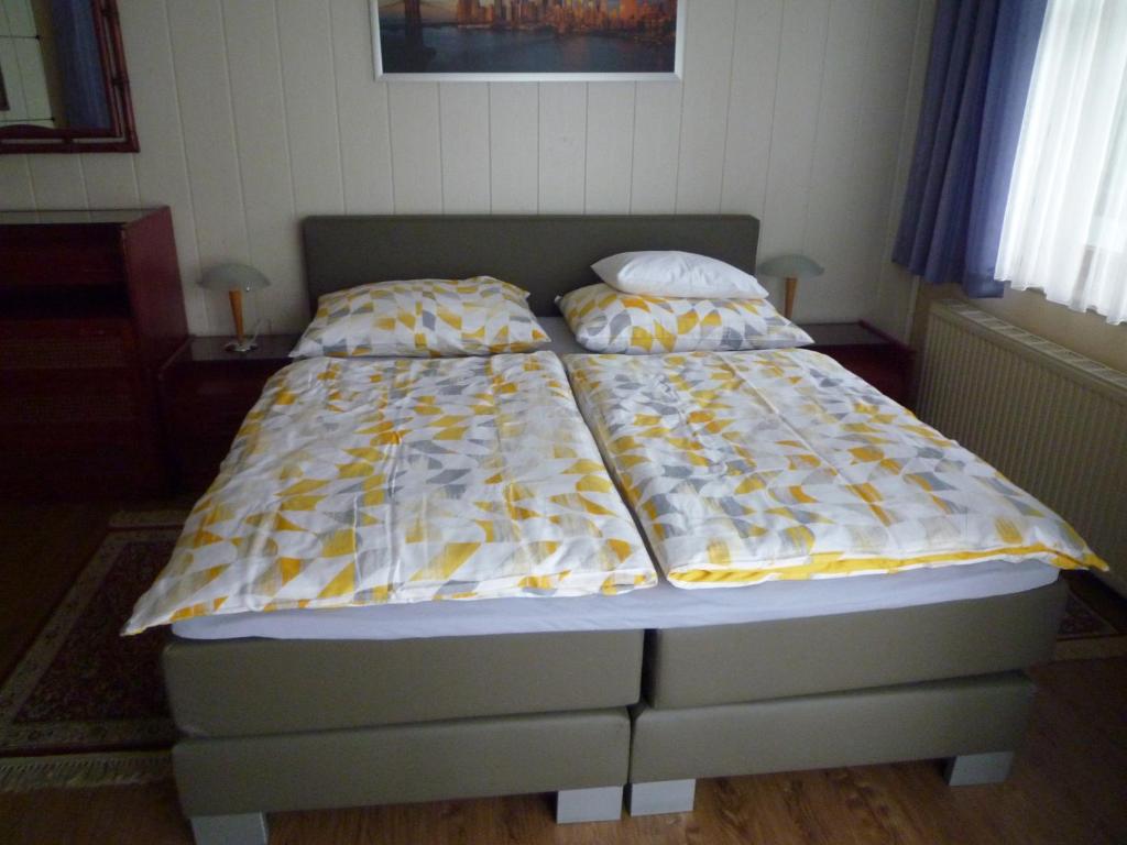 Postel nebo postele na pokoji v ubytování Gartenpension Prosl