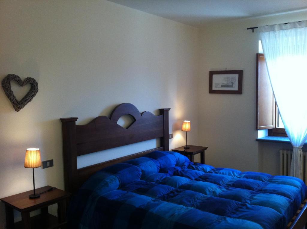 Postel nebo postele na pokoji v ubytování Agriturismo Cioccoleta