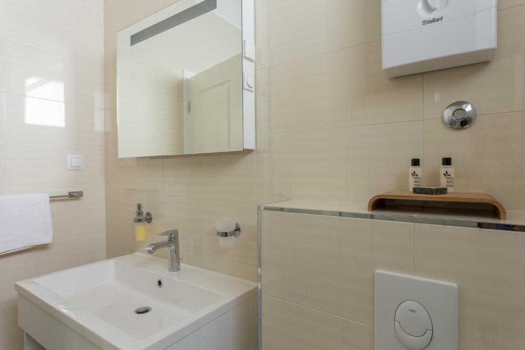 Kúpeľňa v ubytovaní Apartments Villa Victoria
