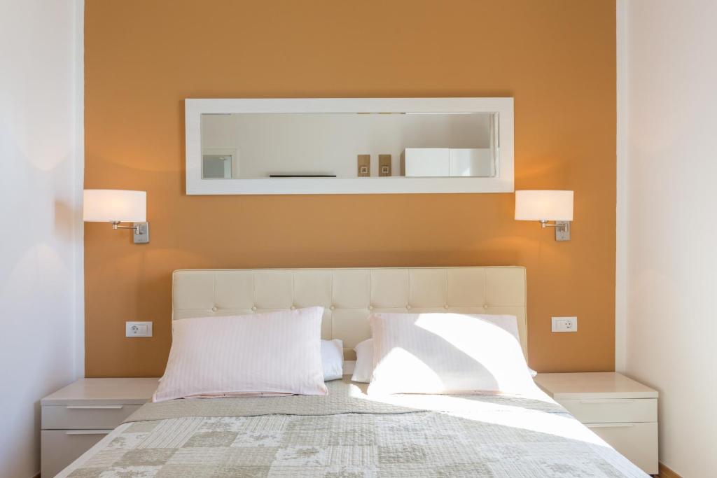 Posteľ alebo postele v izbe v ubytovaní Apartments Villa Victoria
