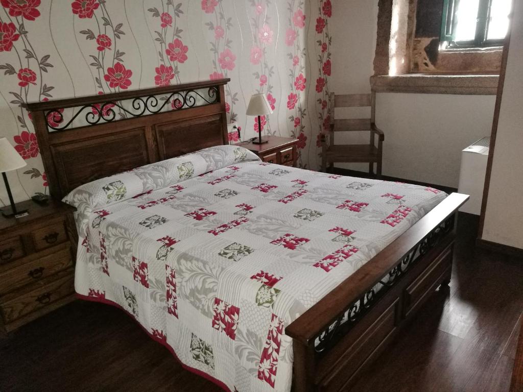 Postel nebo postele na pokoji v ubytování Casa de los Somoza