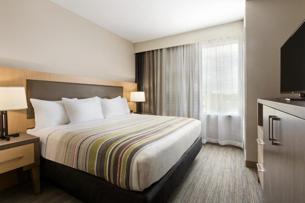 Country Inn & Suites by Radisson, New Braunfels, TX - Salle De Roi