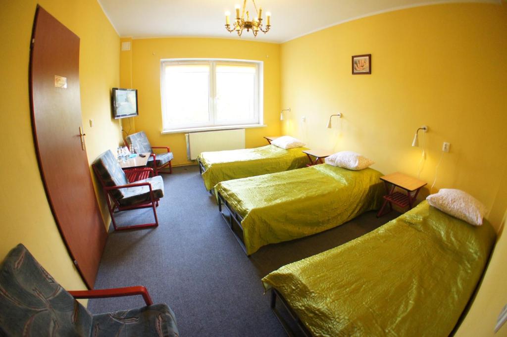 Posteľ alebo postele v izbe v ubytovaní Nest Nocleg Poznań