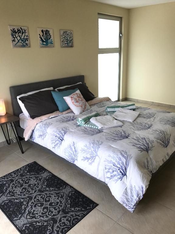 Postel nebo postele na pokoji v ubytování Palapa Beach Resort Curacao