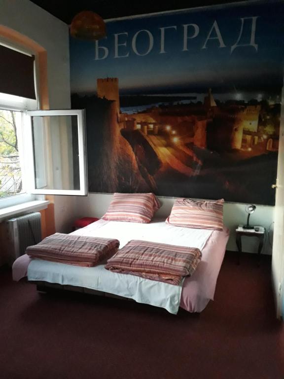 Кровать или кровати в номере Apartman Vrabac