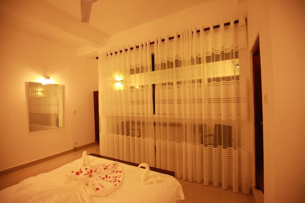 Postel nebo postele na pokoji v ubytování Lavenro Hotel & Resort