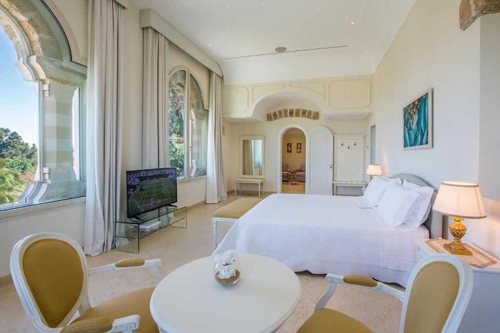 TV a/nebo společenská místnost v ubytování Sangiorgio Resort & Spa