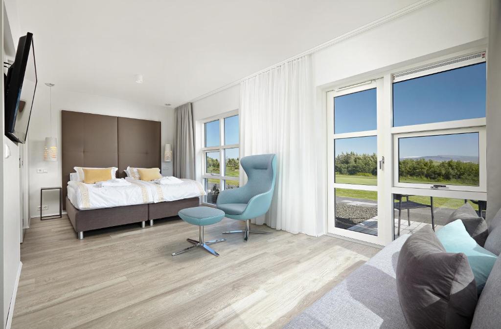 Postel nebo postele na pokoji v ubytování Hotel Hamar
