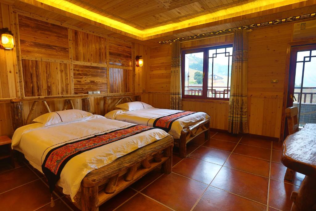 Longji Holiday Hotel - 豪华双胞胎室和山景