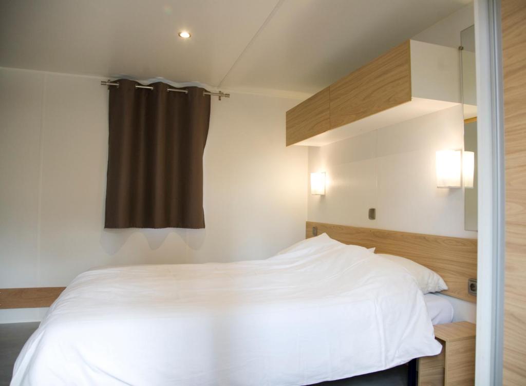 Postel nebo postele na pokoji v ubytování Camping het Wieskamp