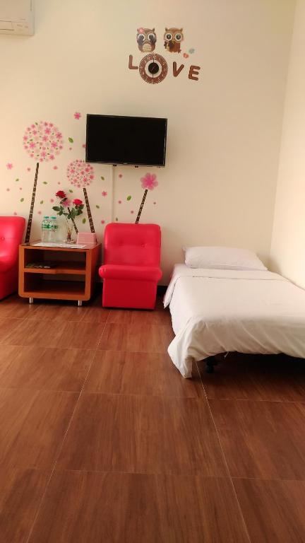 TV a/nebo společenská místnost v ubytování Jin Xi Fu B&B