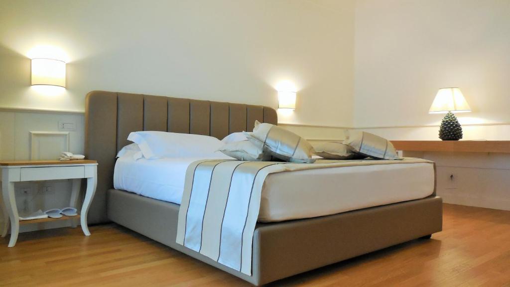 Postel nebo postele na pokoji v ubytování Hotel Marechiaro