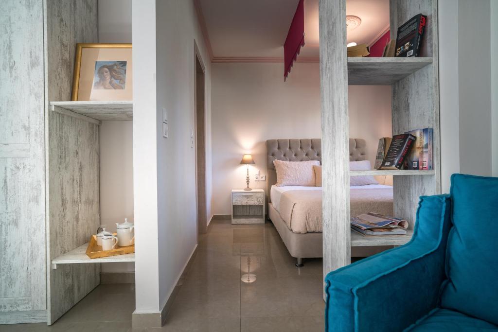 Postel nebo postele na pokoji v ubytování Aeolos Boutique Hotel & Suites