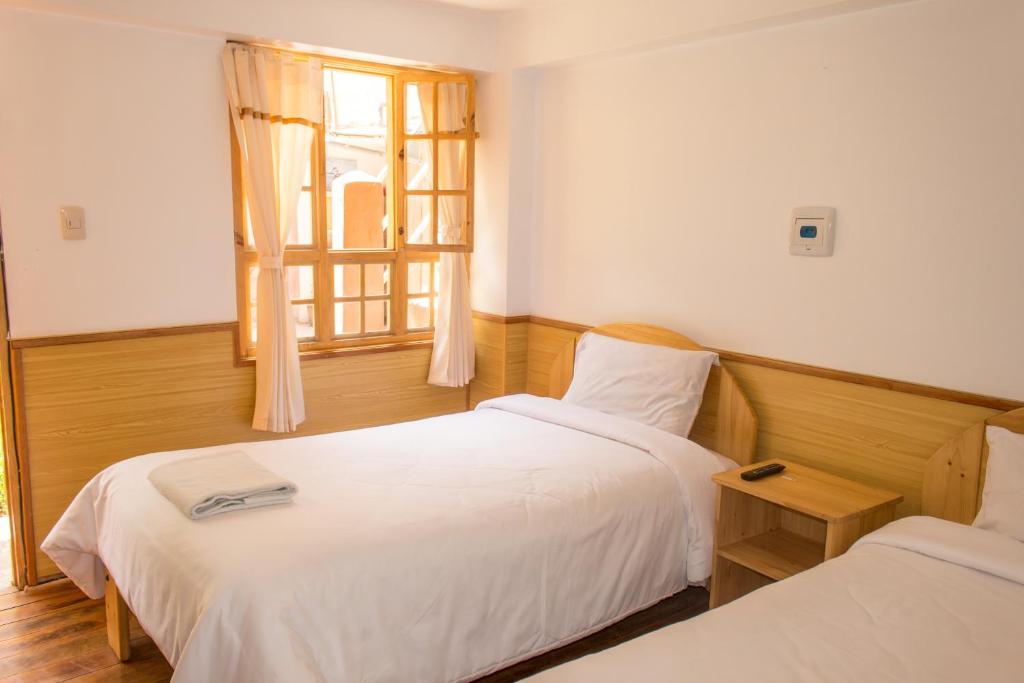 Postel nebo postele na pokoji v ubytování Casa Don Jose B & B