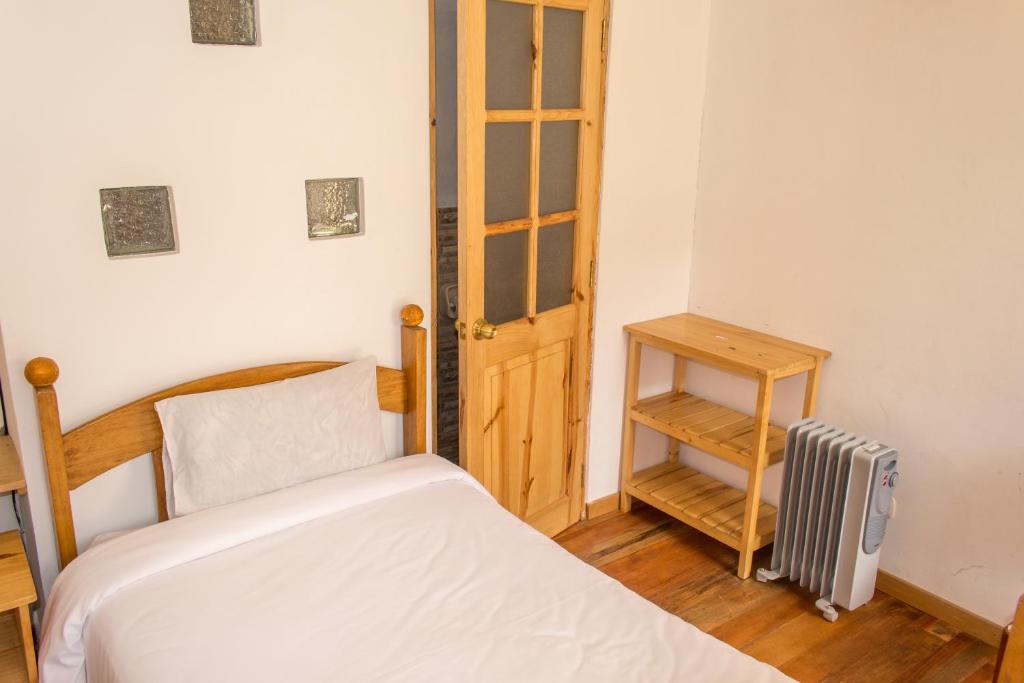 Postel nebo postele na pokoji v ubytování Casa Don Jose B & B