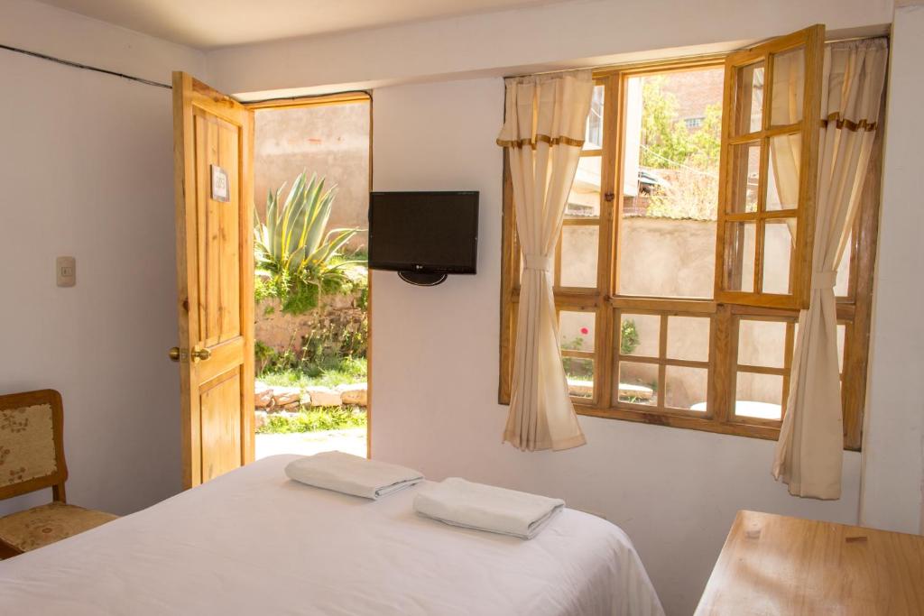 Postel nebo postele na pokoji v ubytování Casa Don Jose B & B