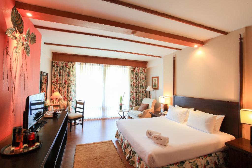 Postel nebo postele na pokoji v ubytování Belle Villa Resort, Chiang Mai