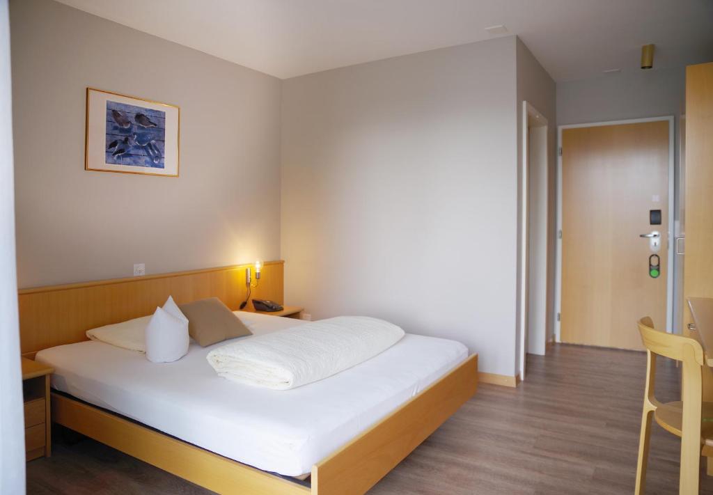 Letto o letti in una camera di Hotel Garni Arnegg