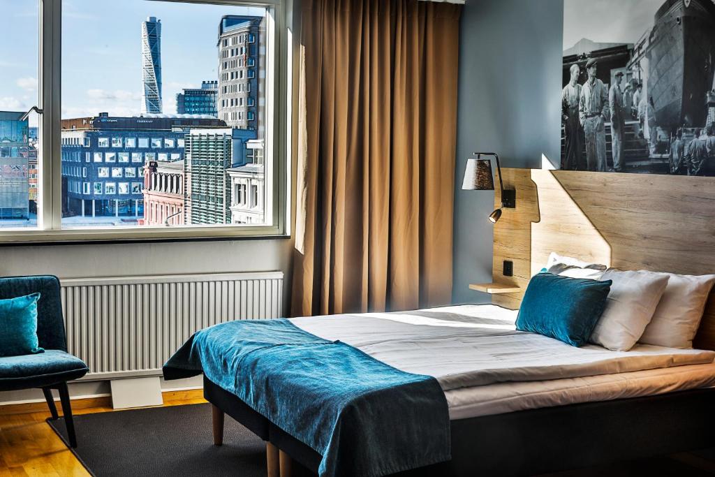 Postel nebo postele na pokoji v ubytování First Hotel Jörgen Kock
