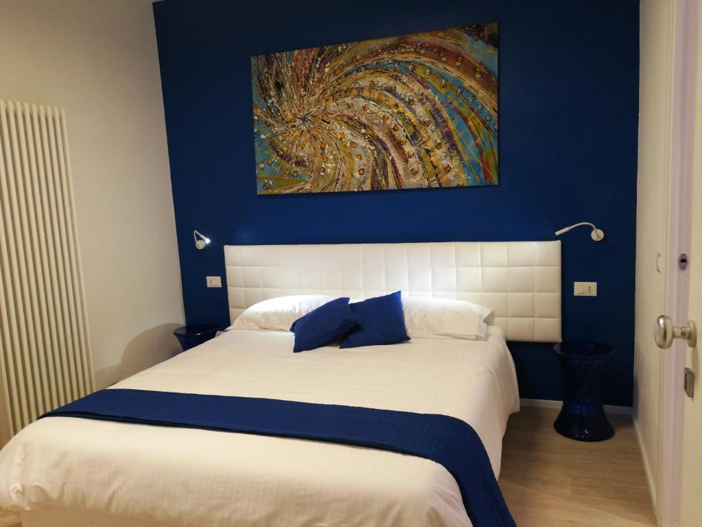 Suite Color Verona客房内的一张或多张床位