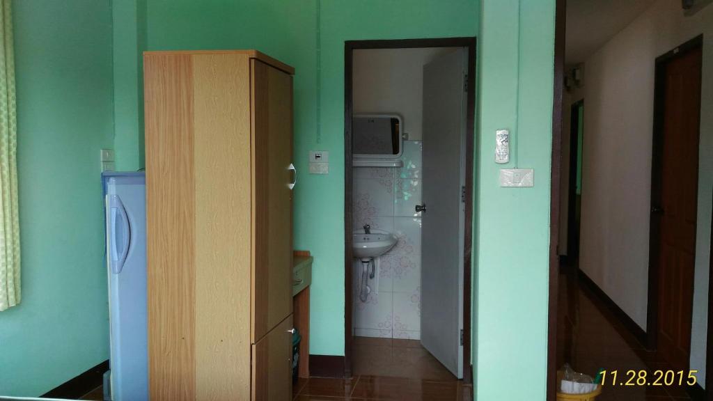 a room with a bathroom with a sink and a toilet at You&Me Hostel in Chiang Mai