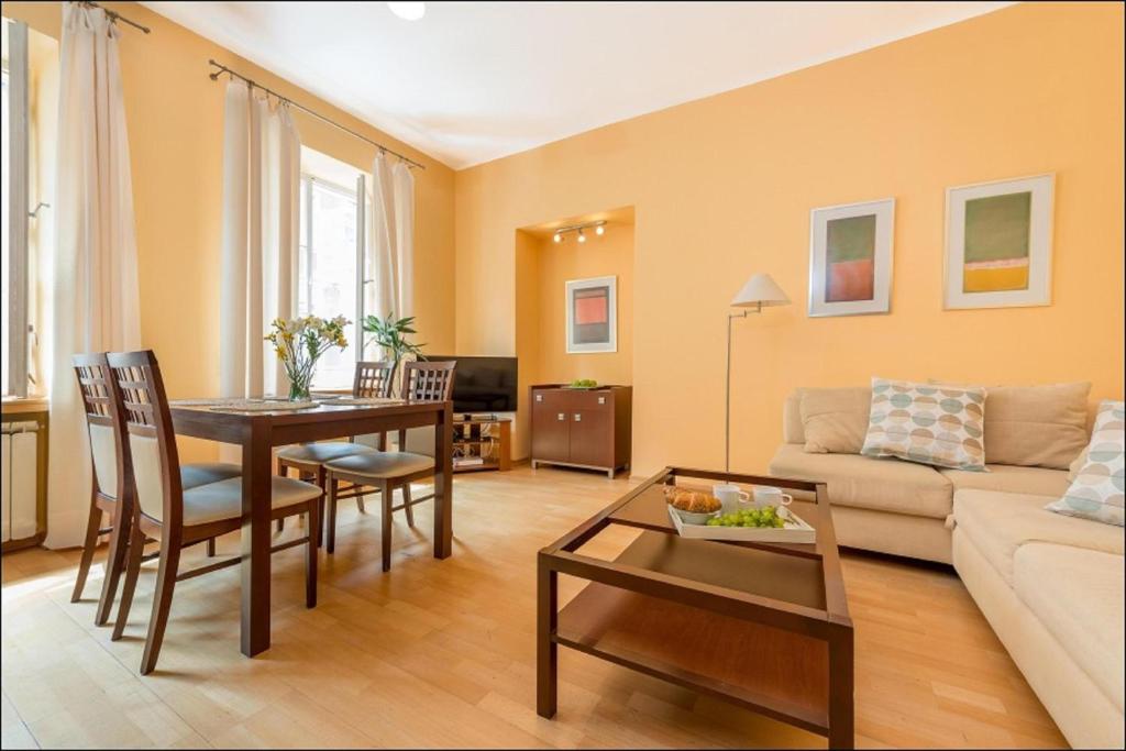 Posedenie v ubytovaní P&O Apartments Piwna