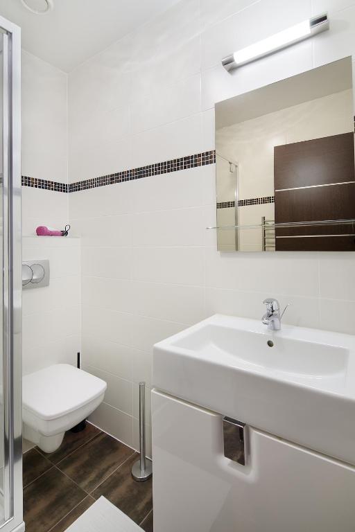Kúpeľňa v ubytovaní Paulay Downtown Apartments