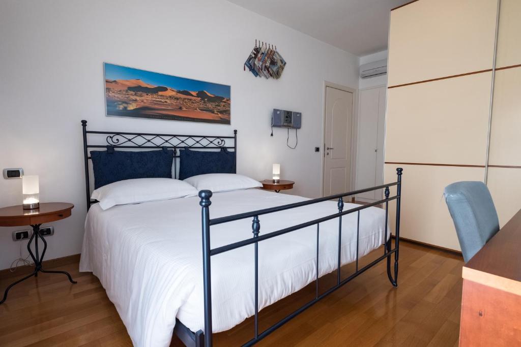 Posteľ alebo postele v izbe v ubytovaní L'ippocampo Guest House