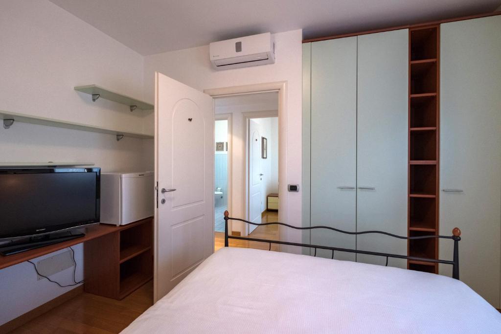 Posteľ alebo postele v izbe v ubytovaní L'ippocampo Guest House