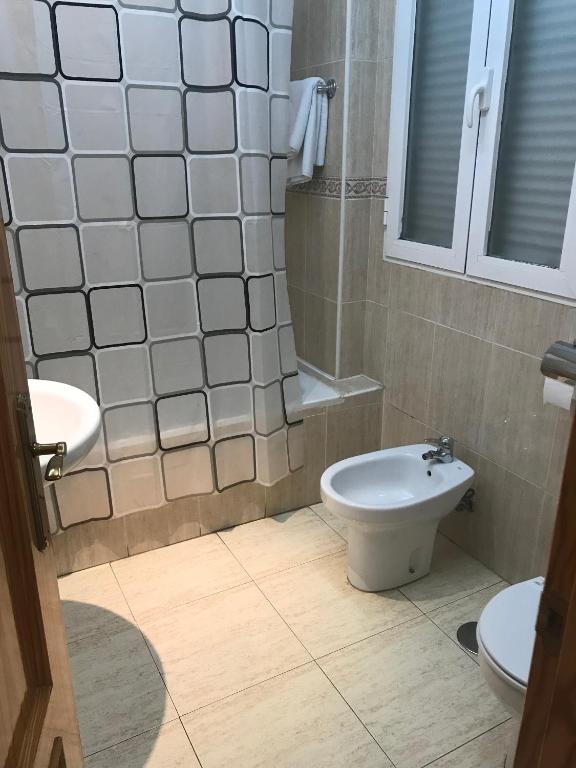 Koupelna v ubytování Hostal 82