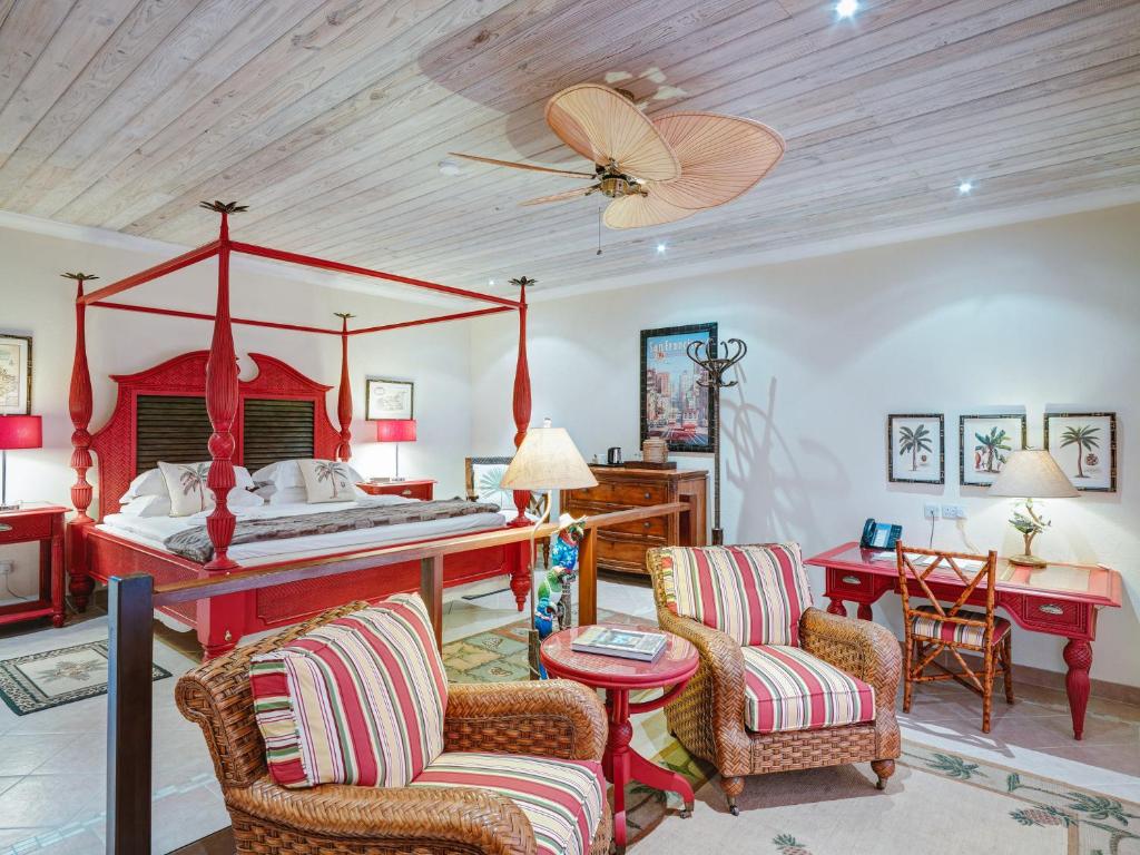 Postel nebo postele na pokoji v ubytování Bequia Beach Hotel - Luxury Boutique Resort