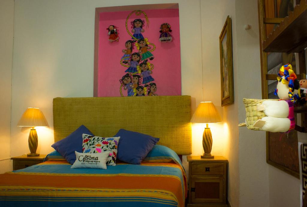 Postel nebo postele na pokoji v ubytování Casona Tlaquepaque Temazcal & Spa