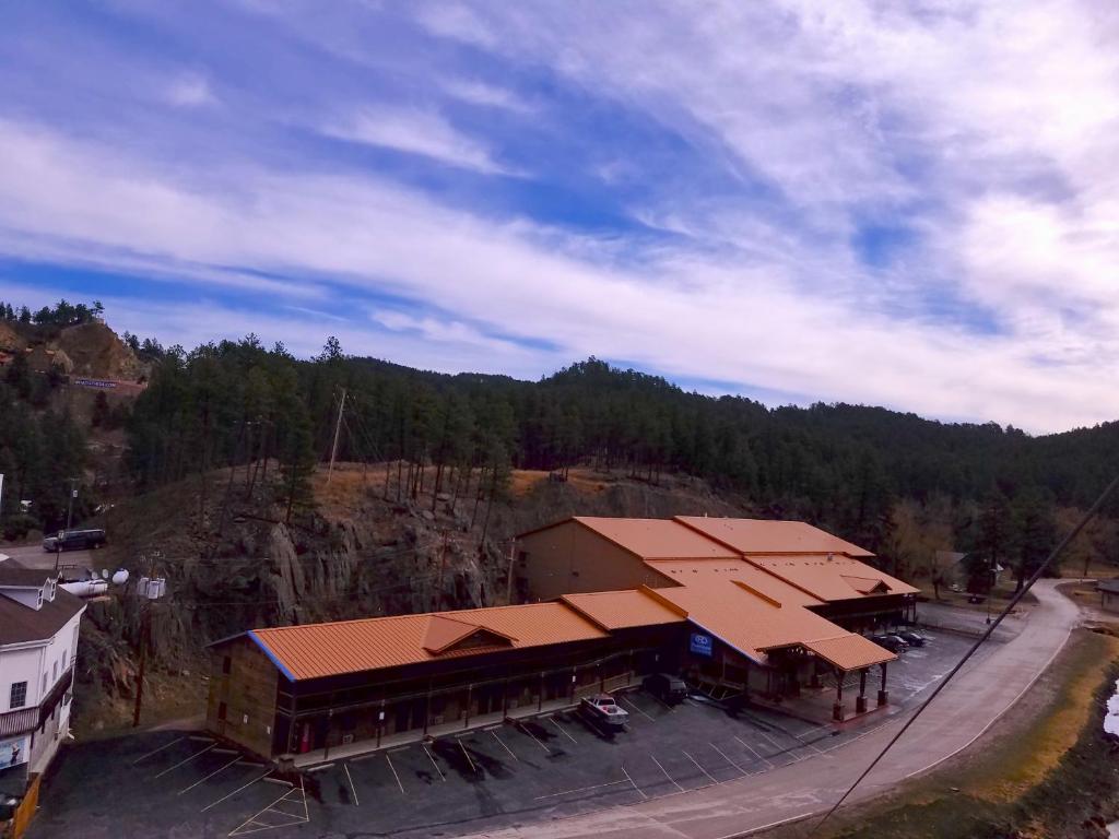 an overhead view of a building on a mountain at Rushmore Express & Suites in Keystone