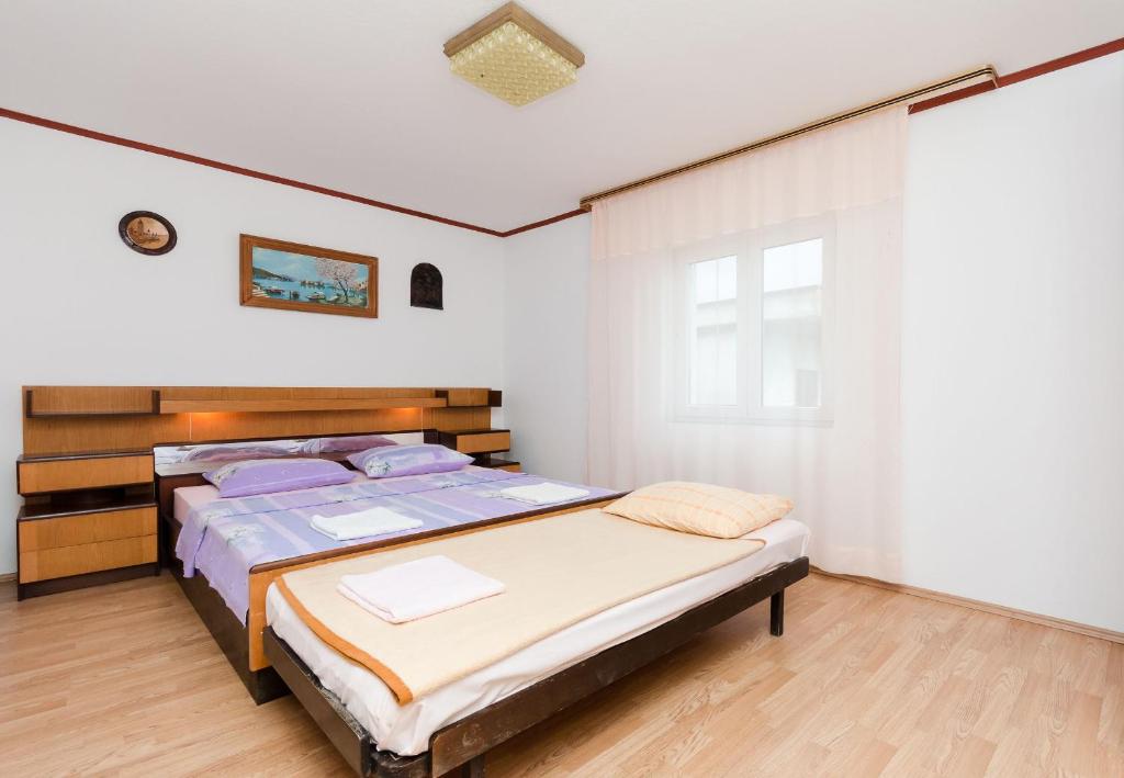 Postel nebo postele na pokoji v ubytování Apartment Stojna