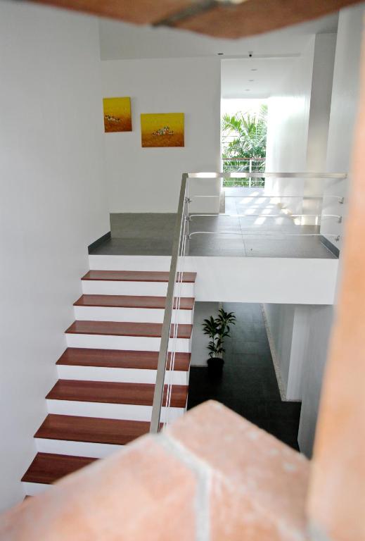 Postel nebo postele na pokoji v ubytování Ampera Avenue Residence
