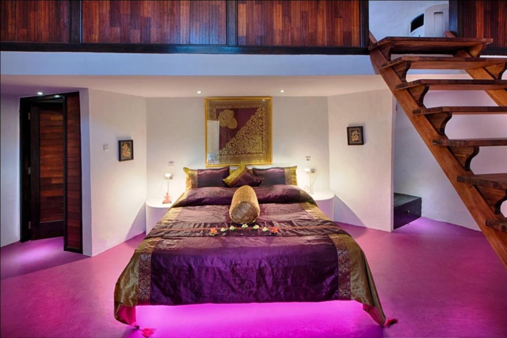 Postel nebo postele na pokoji v ubytování Bel Air Resort
