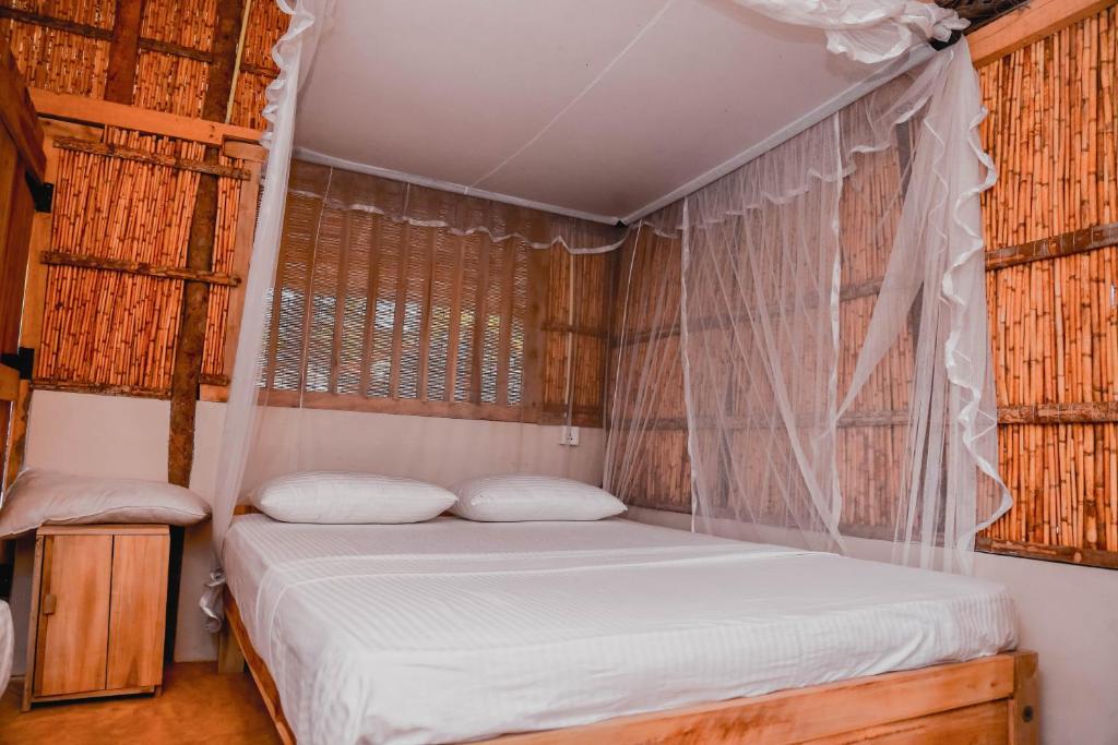 Postel nebo postele na pokoji v ubytování Sandy Edge