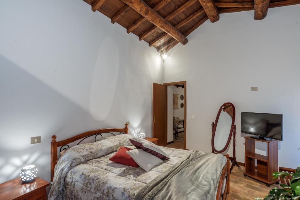 Posteľ alebo postele v izbe v ubytovaní Casa Roma