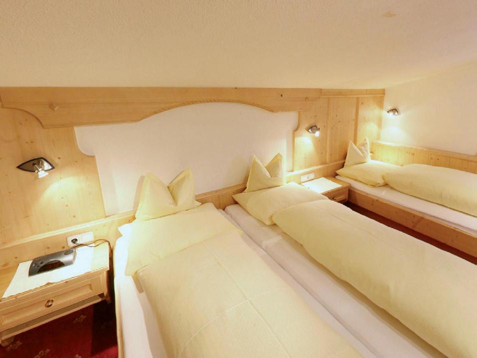 Postel nebo postele na pokoji v ubytování Hotel Sailer