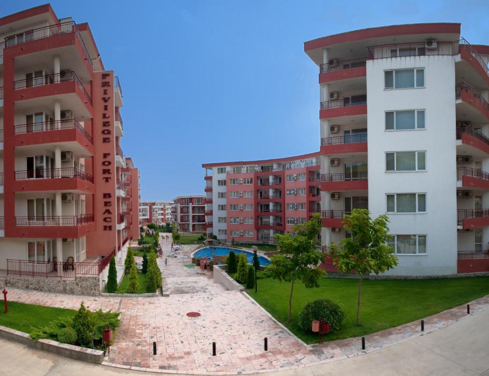 a view of two tall buildings in a city at Privilege Beach Apartments in Sveti Vlas