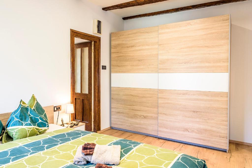 Postel nebo postele na pokoji v ubytování Apartment Studio-25