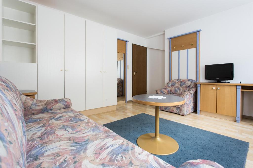 Telewizja i/lub zestaw kina domowego w obiekcie Hotel Das Zentrum