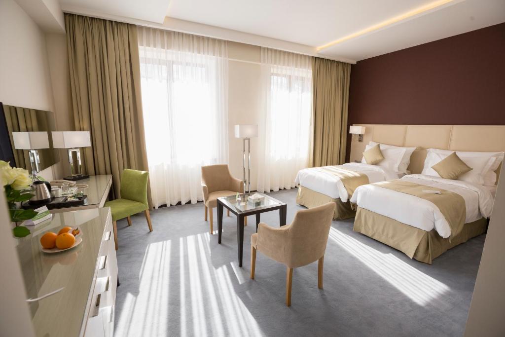 Postel nebo postele na pokoji v ubytování Ararat Resort Tsaghkadzor
