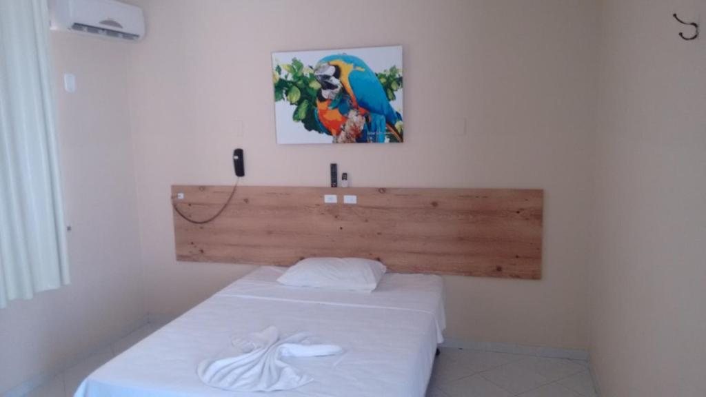Postel nebo postele na pokoji v ubytování Infinity Pousada