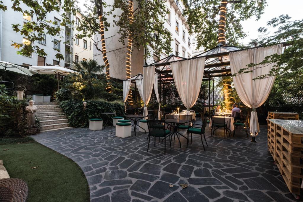 Сад в Hotel Manin