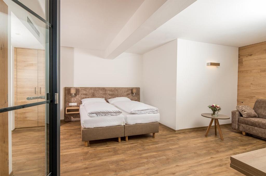 Posteľ alebo postele v izbe v ubytovaní Hotel & Restaurant Rupertigau